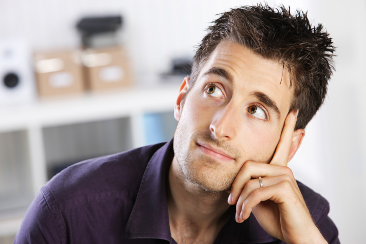 man thinking about SEER and EER ratings