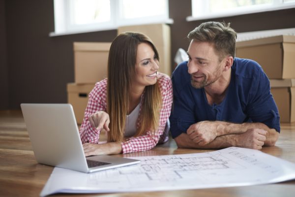 couple researching the right air conditioner for their home